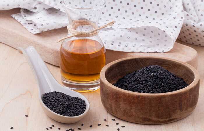 Come usare l'olio di semi nero (Kalonji) per i capelli Crescita e calvizie